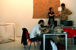 Christian working (Carles and Francesca in the background)  - thumbnail